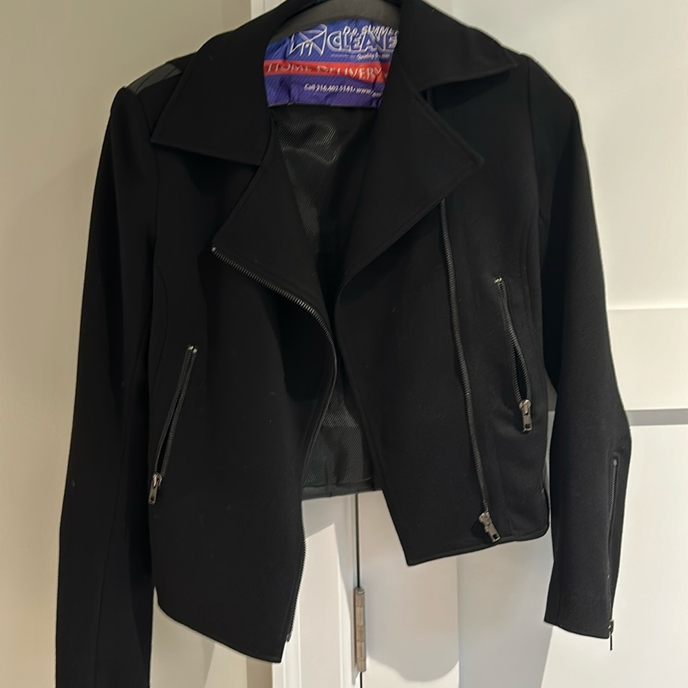 Black moto style jacket with leather details